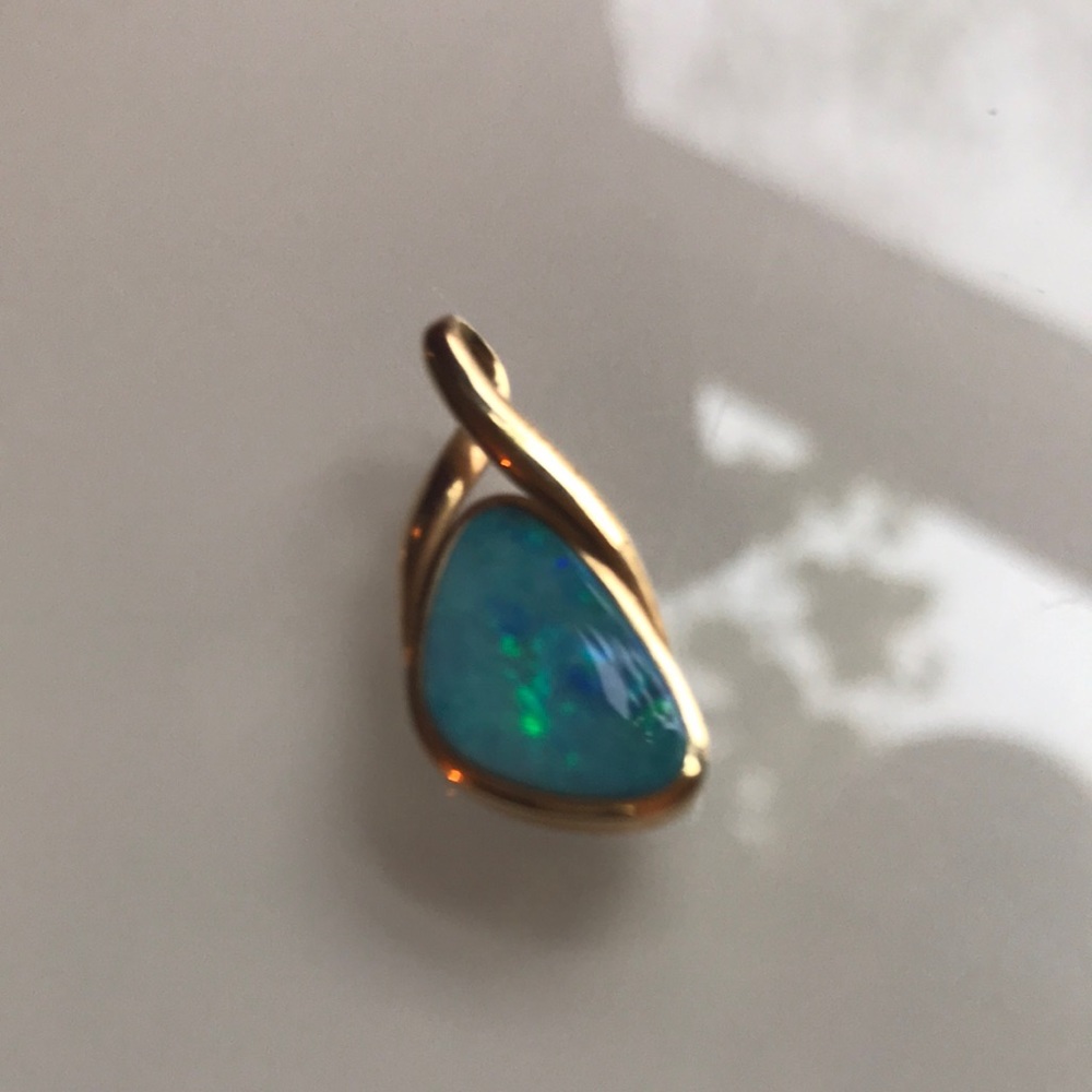 14k opal pendant.